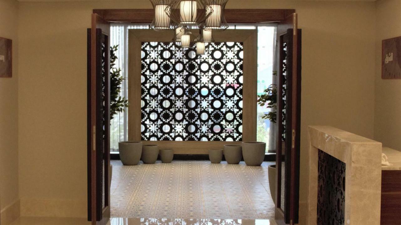Park Inn By Radisson Makkah Aziziyah Mekka Exteriér fotografie A decorative panel of glass